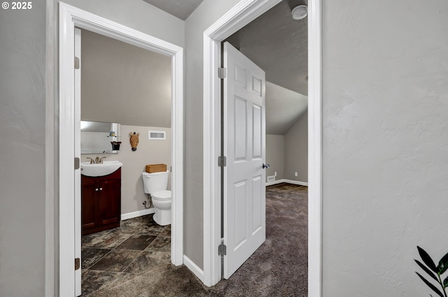1364 Goodpasture Island Rd, Eugene, OR 97401 - half bath with vanity, toilet, baseboards, and vaulted ceiling