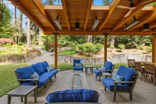 view of patio / terrace featuring ceiling fan and an outdoor hangout area