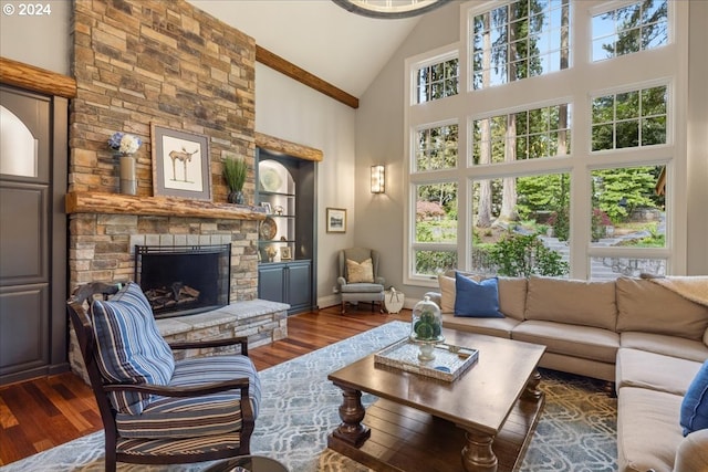 living room with high vaulted ceiling, dark hardwood / wood-style floors, and a fireplace