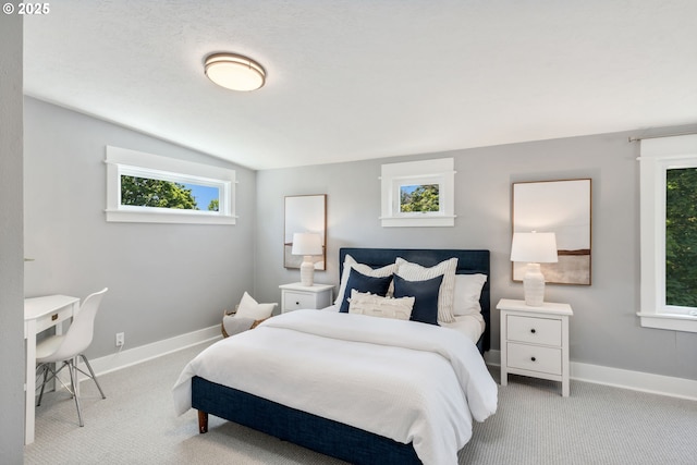 6126 SE 23rd Ave, Portland, OR 97202 - bedroom with carpet floors, lofted ceiling, and an office area