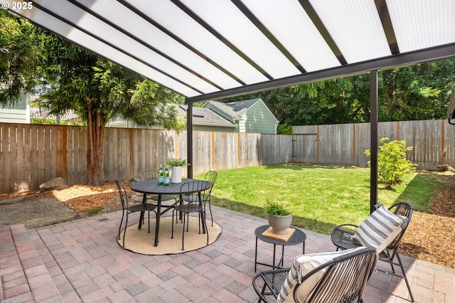 6126 SE 23rd Ave, Portland, OR 97202 - fenced backyard featuring a patio area and outdoor dining space