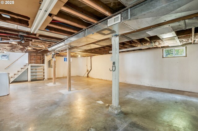 6126 SE 23rd Ave, Portland, OR 97202 - basement featuring stairway and washer / dryer