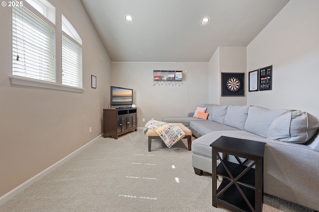living area featuring baseboards, recessed lighting, carpet, and vaulted ceiling