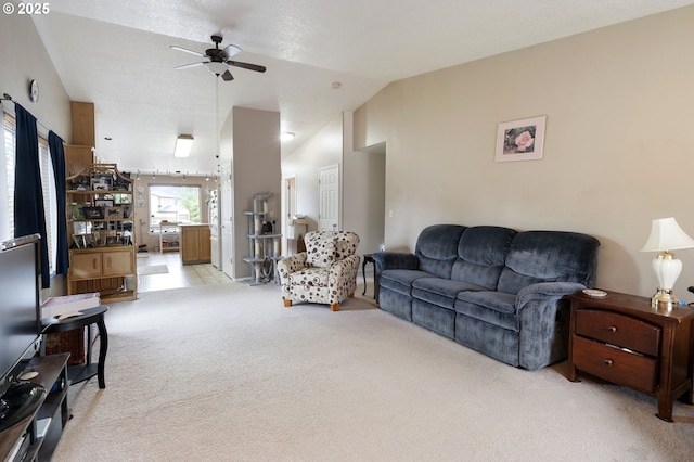 13810 NE 89th Cir, Vancouver, WA 98682 - carpeted living room with a ceiling fan and vaulted ceiling