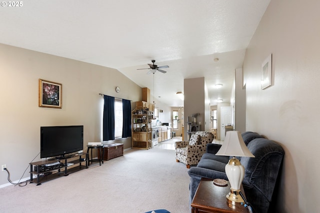 13810 NE 89th Cir, Vancouver, WA 98682 - living area featuring light colored carpet, ceiling fan, vaulted ceiling, and baseboards