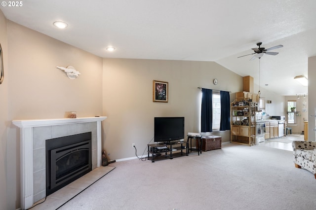 13810 NE 89th Cir, Vancouver, WA 98682 - living room with light colored carpet, lofted ceiling, ceiling fan, a fireplace, and baseboards