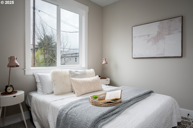 bedroom with multiple windows