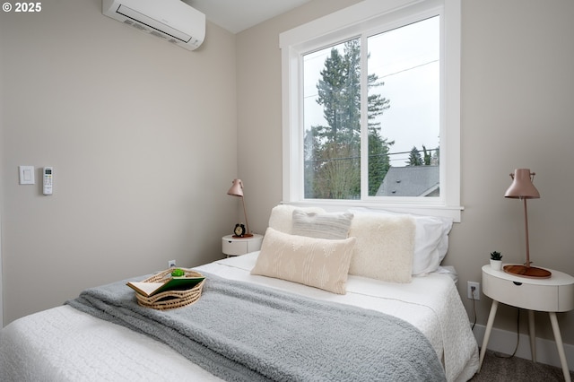 bedroom featuring an AC wall unit