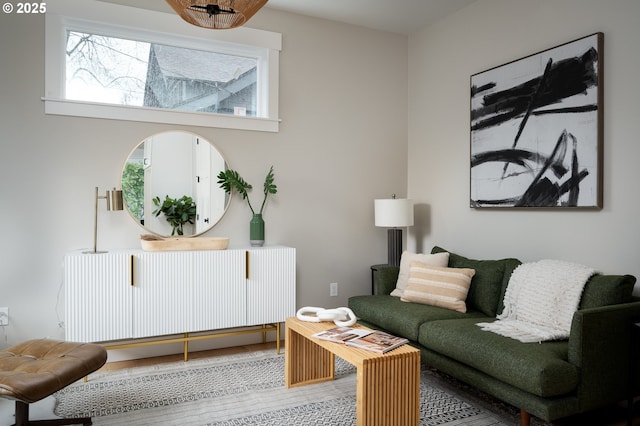 living room with a healthy amount of sunlight and wood-type flooring