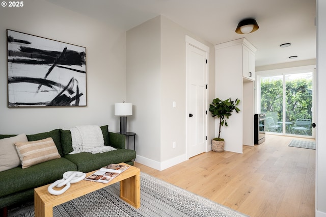 living room with light hardwood / wood-style floors