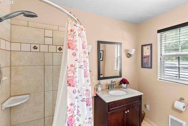 1042 W State Route 4, Cathlamet, WA 98612 - bathroom featuring vanity, a tile shower, and visible vents