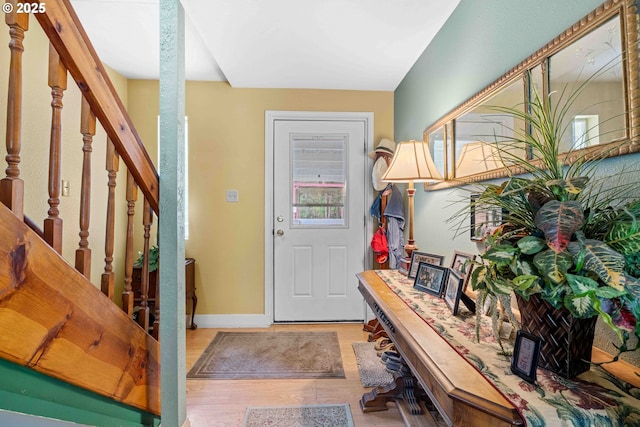 1042 W State Route 4, Cathlamet, WA 98612 - entryway featuring stairway, baseboards, and wood finished floors