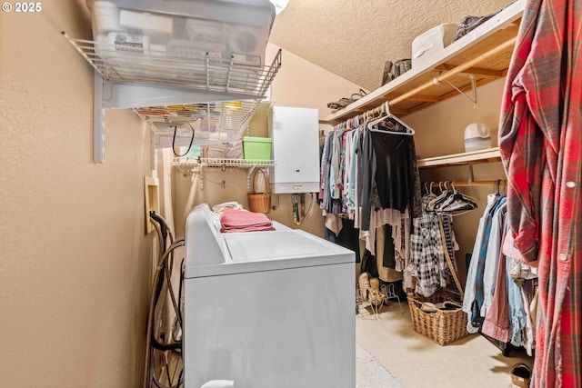 1042 W State Route 4, Cathlamet, WA 98612 - laundry room featuring independent washer and dryer, laundry area, and water heater