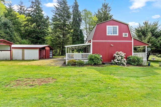 1042 W State Route 4, Cathlamet, WA 98612 - view of pole building with a lawn and covered porch