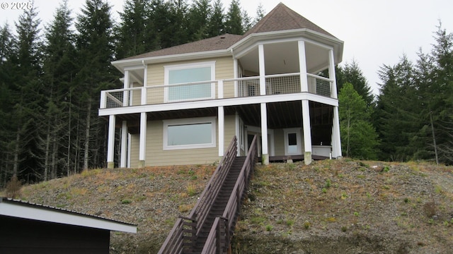 46345 Dement Creek Rd, Myrtle Point, OR 97458 - view of front of house with stairway and a balcony