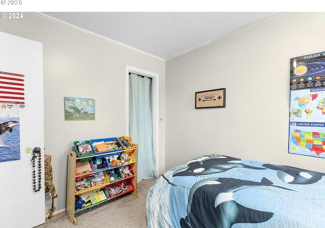 bedroom featuring carpet and crown molding