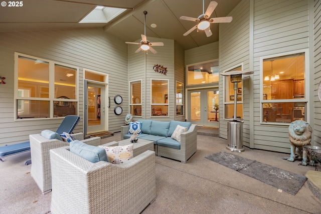 view of patio / terrace featuring french doors, ceiling fan, and outdoor lounge area