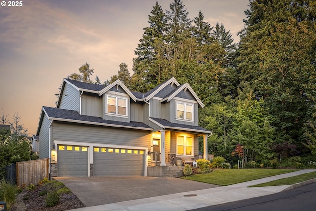 16290 SE Eckert Ln, Damascus, OR 97089 - craftsman house with a garage, concrete driveway, board and batten siding, stone siding, and a porch