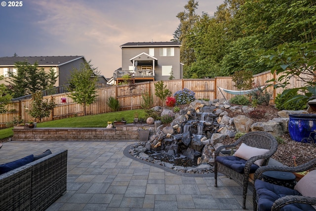 16290 SE Eckert Ln, Damascus, OR 97089 - fenced backyard with a patio area