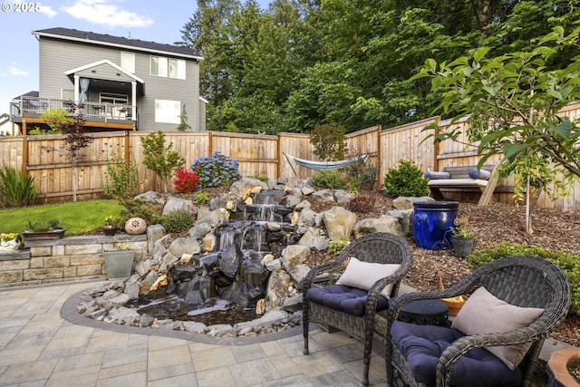 16290 SE Eckert Ln, Damascus, OR 97089 - fenced backyard with a patio