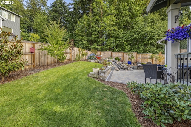 16290 SE Eckert Ln, Damascus, OR 97089 - fenced backyard with a patio area