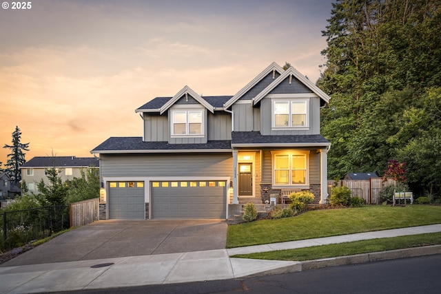 16290 SE Eckert Ln, Damascus, OR 97089 - craftsman house featuring board and batten siding, stone siding, an attached garage, concrete driveway, and covered porch