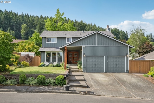 16318 SW Wright St, Beaverton, OR 97007 - view of front of house featuring an attached garage, driveway, a chimney, and roof with shingles
