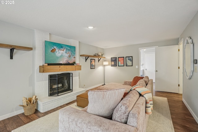 16318 SW Wright St, Beaverton, OR 97007 - living area with wood finished floors, a fireplace, and recessed lighting