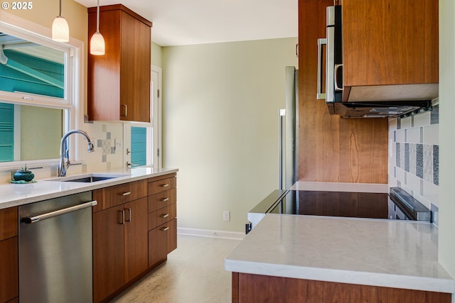 2445 SE 76th Ave, Portland, OR 97206 - kitchen featuring a sink, stainless steel appliances, decorative backsplash, and light countertops
