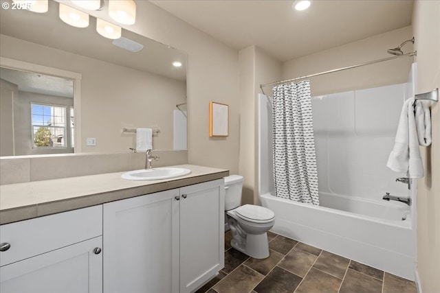 bathroom with toilet, shower / tub combo with curtain, vanity, and recessed lighting