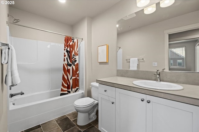 bathroom with toilet, shower / bathtub combination with curtain, and vanity