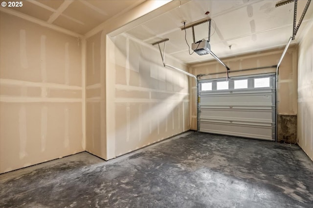garage featuring a garage door opener