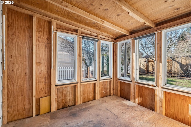 unfurnished sunroom featuring wooden ceiling