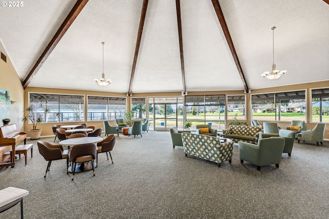 interior space with a chandelier and beam ceiling