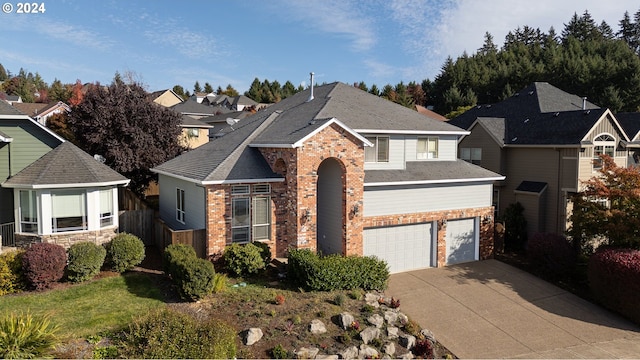 front of property with a garage