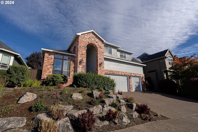 front of property with a garage