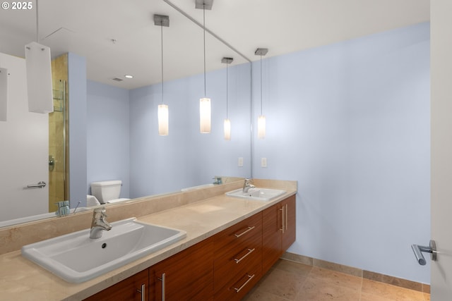 1830 NW Riverscape St Unit 406, Portland, OR 97209 - full bath featuring double vanity, toilet, a shower with door, and a sink