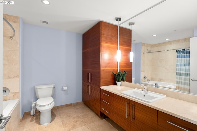1830 NW Riverscape St Unit 406, Portland, OR 97209 - bathroom with vanity, toilet, shower / bath combo with shower curtain, recessed lighting, and visible vents