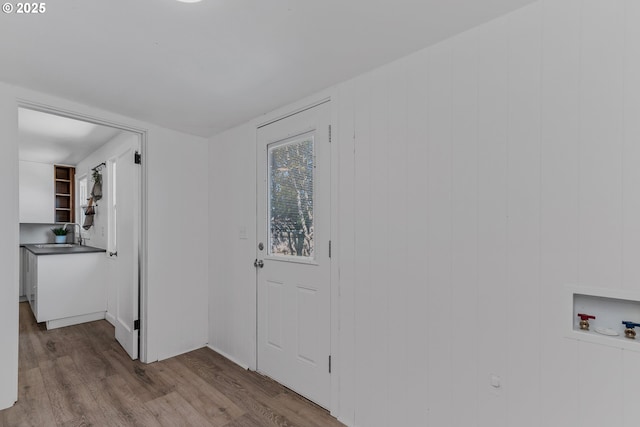 foyer with wood finished floors