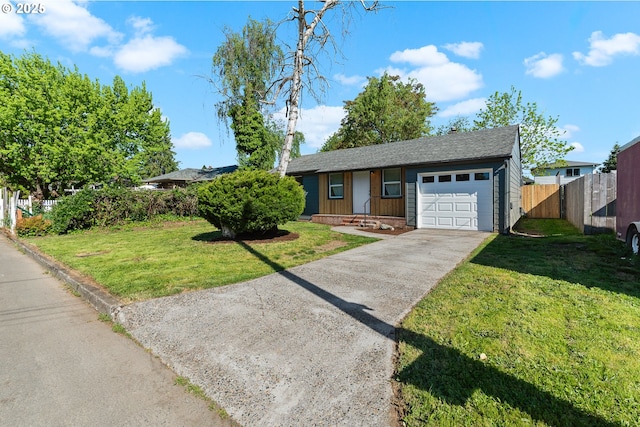 single story home with fence, an attached garage, a front lawn, and concrete driveway