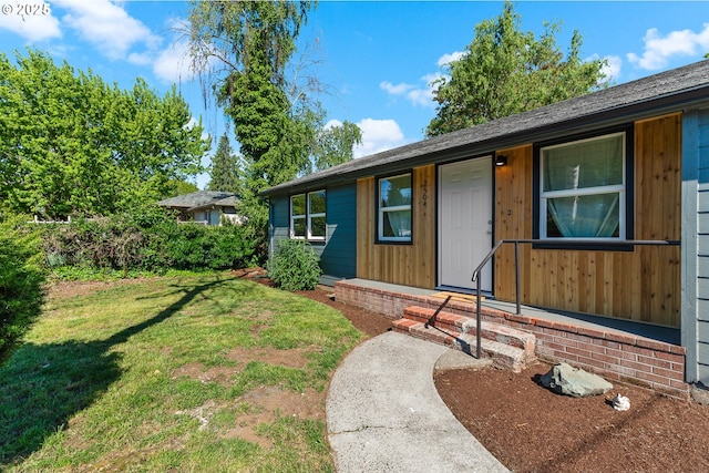 exterior space with a front yard