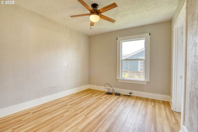 1206 E 9th St, The Dalles, OR 97058 - empty room featuring a ceiling fan, baseboards, and wood finished floors