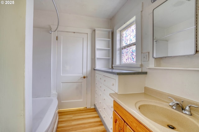 1206 E 9th St, The Dalles, OR 97058 - bathroom with vanity and wood finished floors