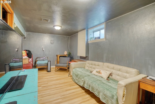 living room with wood-type flooring