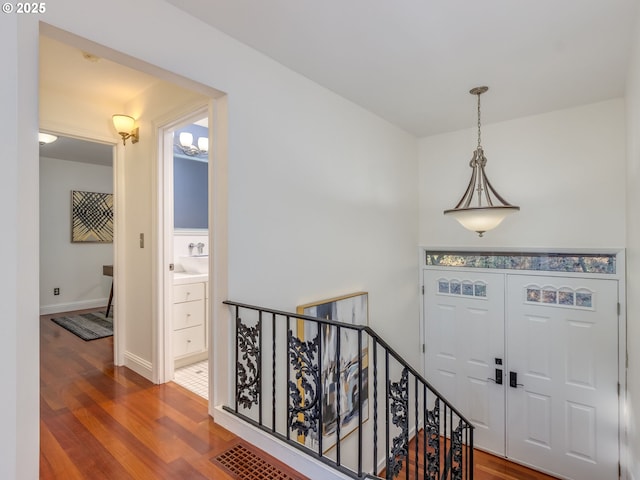 entrance foyer featuring hardwood / wood-style flooring