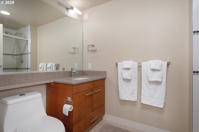 bathroom with tile patterned floors, an enclosed shower, toilet, baseboards, and vanity