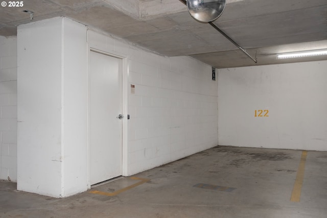 parking deck with a garage door opener and concrete block wall