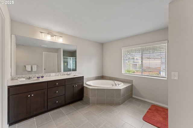 9465 N Alder St, Camas, WA 98607 - bathroom with double vanity, a bath, tile patterned flooring, and a shower stall