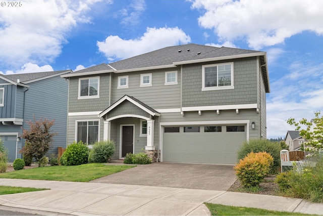 9465 N Alder St, Camas, WA 98607 - craftsman house featuring a garage, concrete driveway, and a front yard