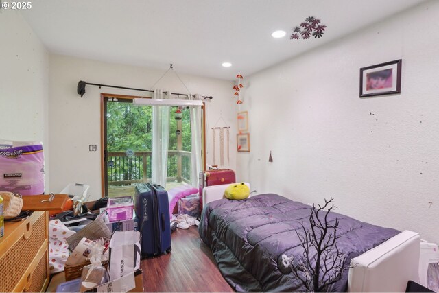 bedroom featuring wood finished floors
